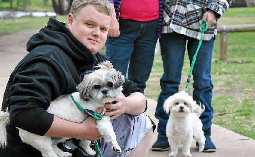 Jake Kiernan, and his parents Janelle and Jim Kiernan, use the facilities around Queens Park to walk their two dogs and enjoy lunches together. Jake Kiernan, and his parents Janelle and Jim Kiernan, use the facilities around Queens Park to walk their two dogs and enjoy lunches together.